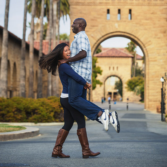 Erica Liu Williams founder of Gr8nola lIfting her husband tank in San Fransisco, California 